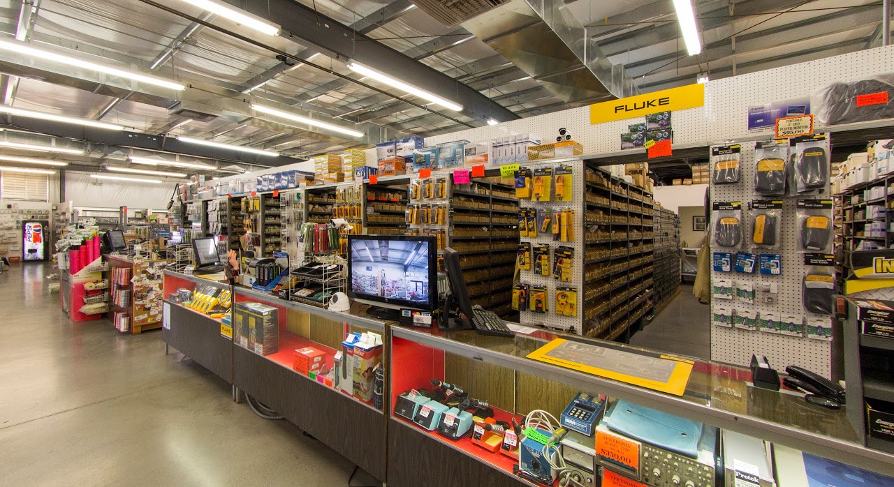 Interior of an Elliott Electric Supply branch — fully stocked aisles of electrical materials, tools, and Fluke test equipment